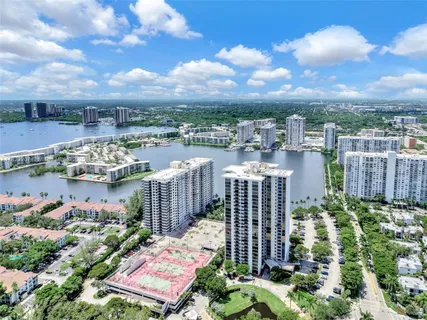 a view of a city with tall buildings