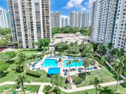 a view of a swimming pool with a sitting space