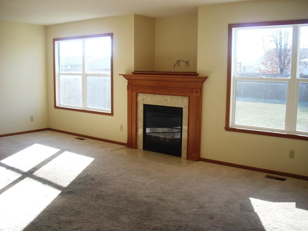 11090 Chicory Ridge Way Roscoe, IL 61073 - Photo 6 of 17 a view of an empty room with a window