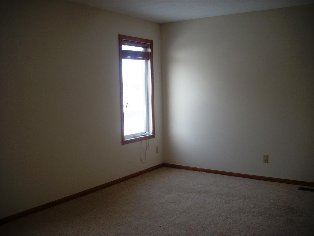11090 Chicory Ridge Way Roscoe, IL 61073 - Photo 9 of 17 an empty room with a window