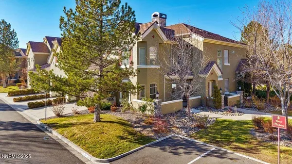 a view of a house with swimming pool