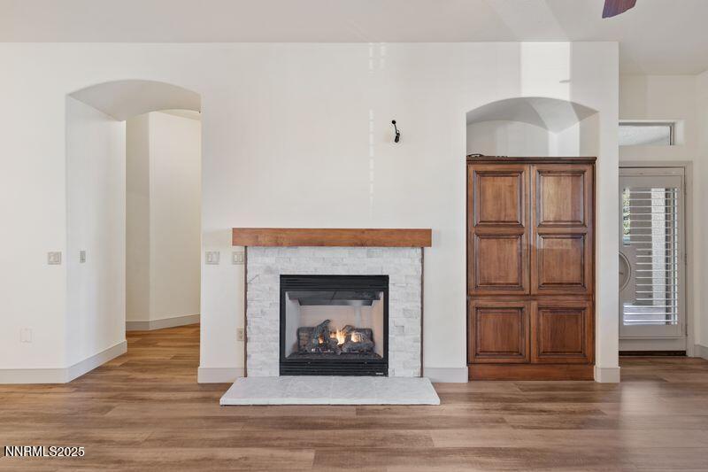 9900 Wilbur May Parkway, Unit 2501 Reno, NV 89521 - Photo 11 of 37 a living room with furniture and a fireplace