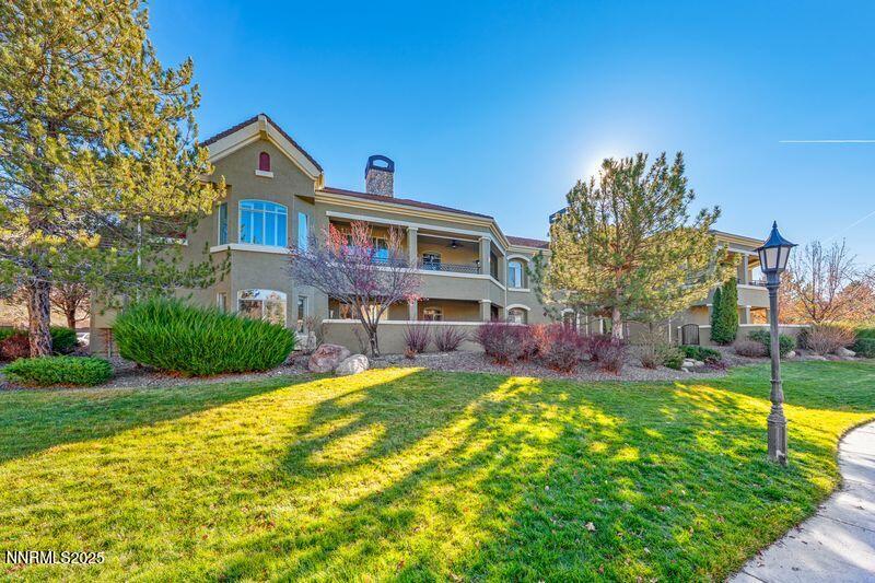 9900 Wilbur May Parkway, Unit 2501 Reno, NV 89521 - Photo 28 of 37 a front view of a house with a yard