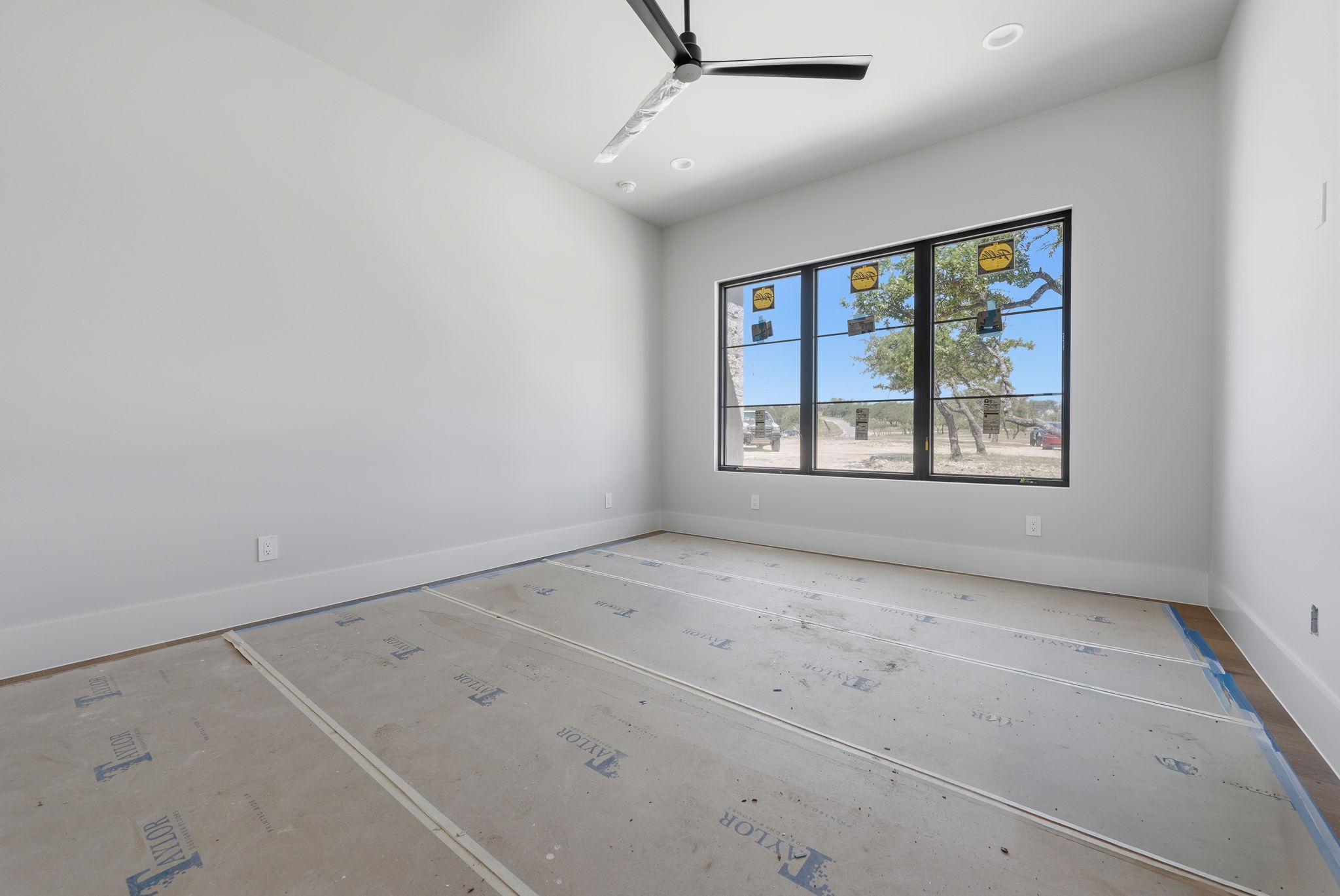 3300 Rm -165 Dripping Springs Dripping Springs, TX 78620 - Photo 20 of 32 an empty room with windows and closet