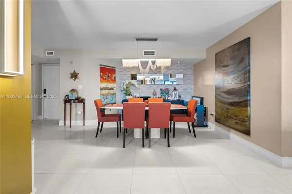 a view of a dining room with furniture