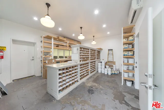 a view of kitchen with furniture and window