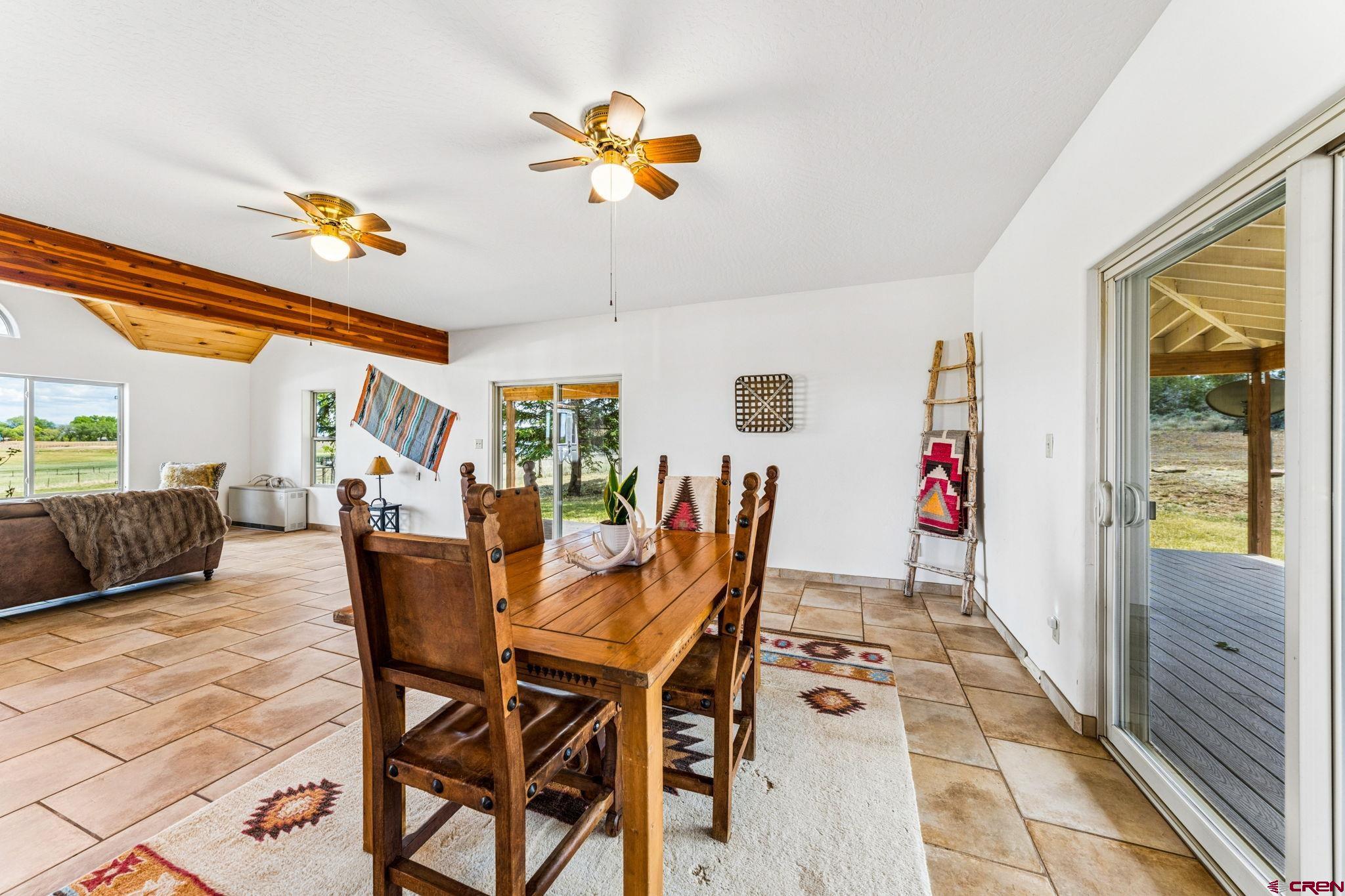 22480 Rd L Cortez, CO 81321 - Photo 7 of 44 a dining room with furniture and window