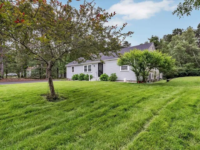 a house view with garden space