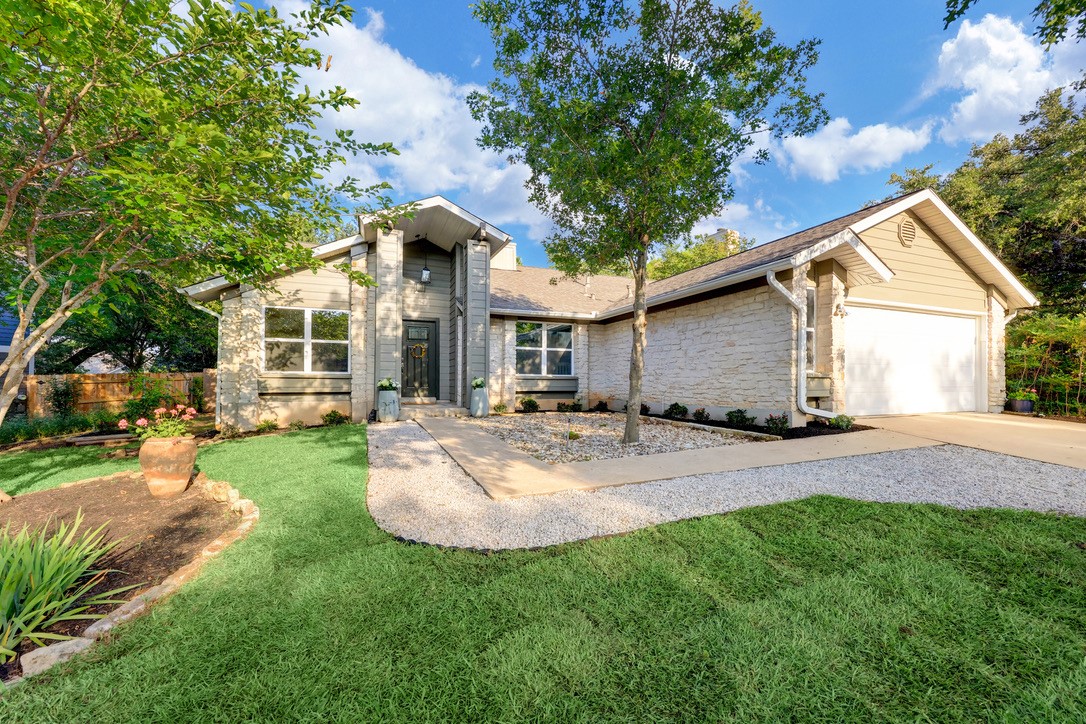 11903 Rickem Cove Austin, TX 78758 - Photo 1 of 1 a view of a house with backyard and sitting area
