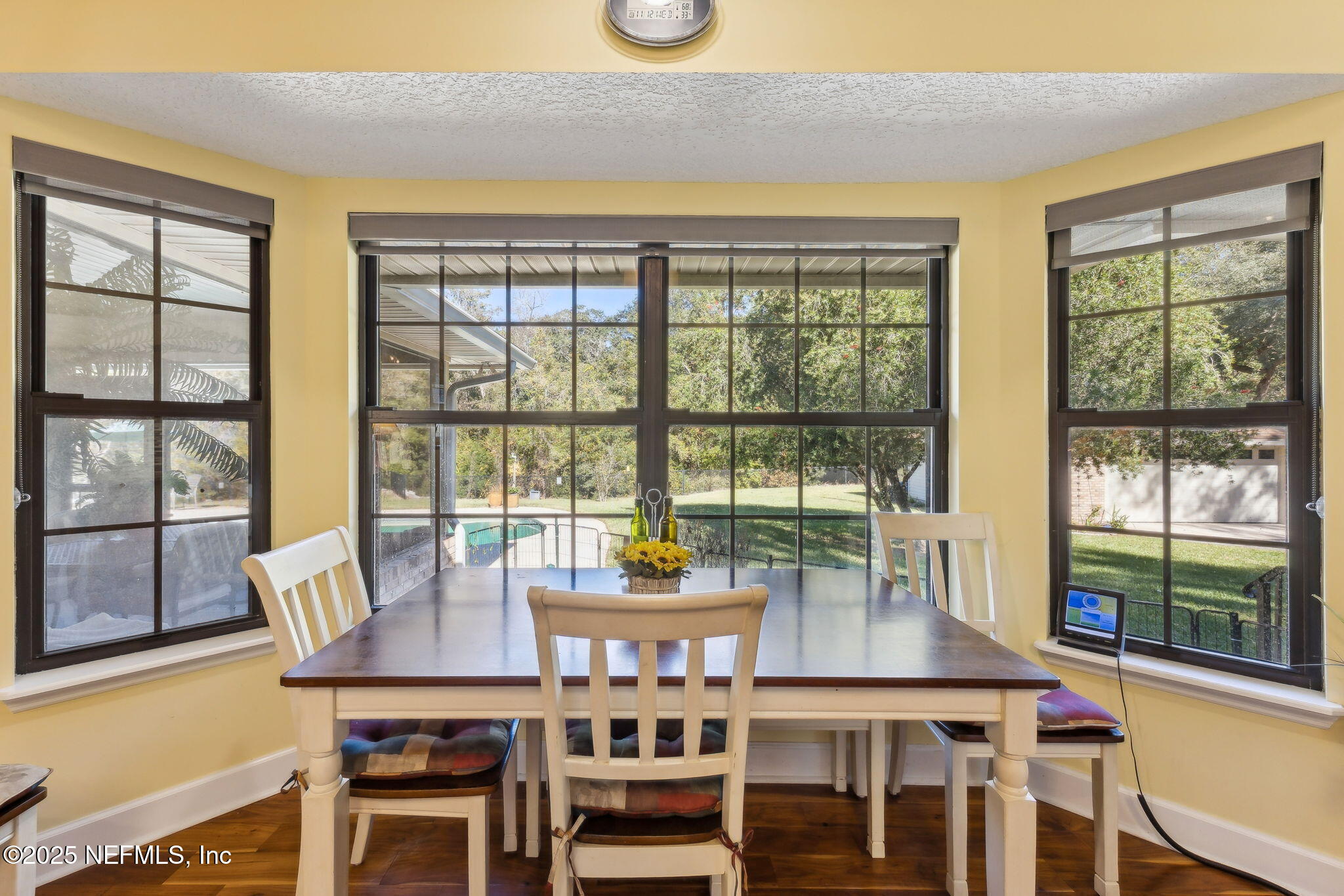 6897 Miltondale Road Macclenny, FL 32063 - Photo 14 of 58 breakfast table overlooks backyard/pool