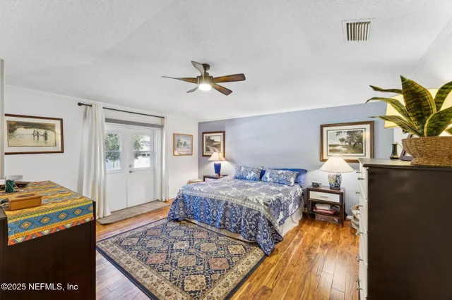 a bathroom with a sink double vanity granite and a mirror
