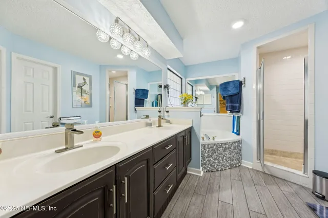 a living room with furniture a rug and a flat screen tv
