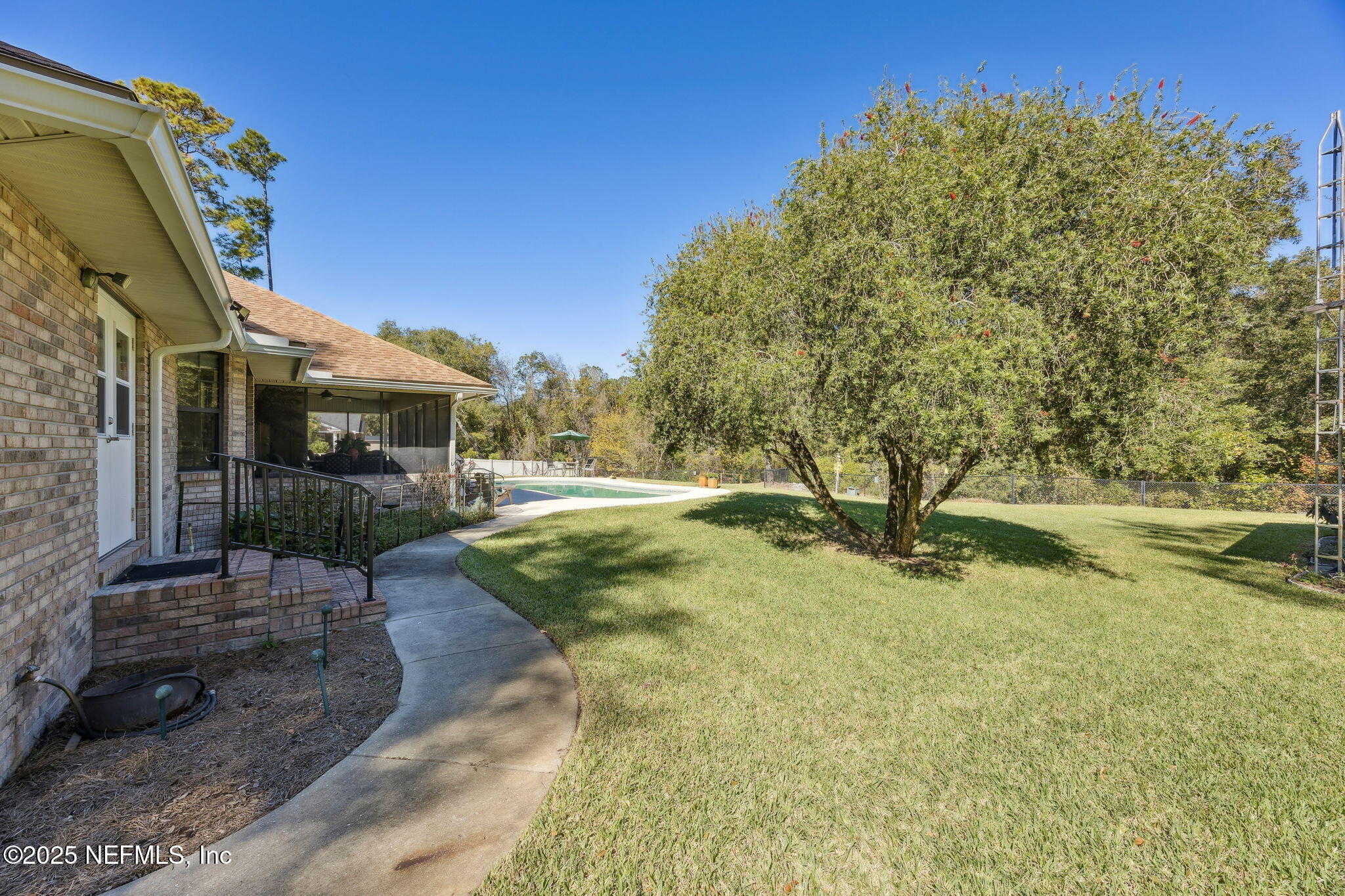 6897 Miltondale Road Macclenny, FL 32063 - Photo 45 of 58 a view of outdoor space yard and swimming pool