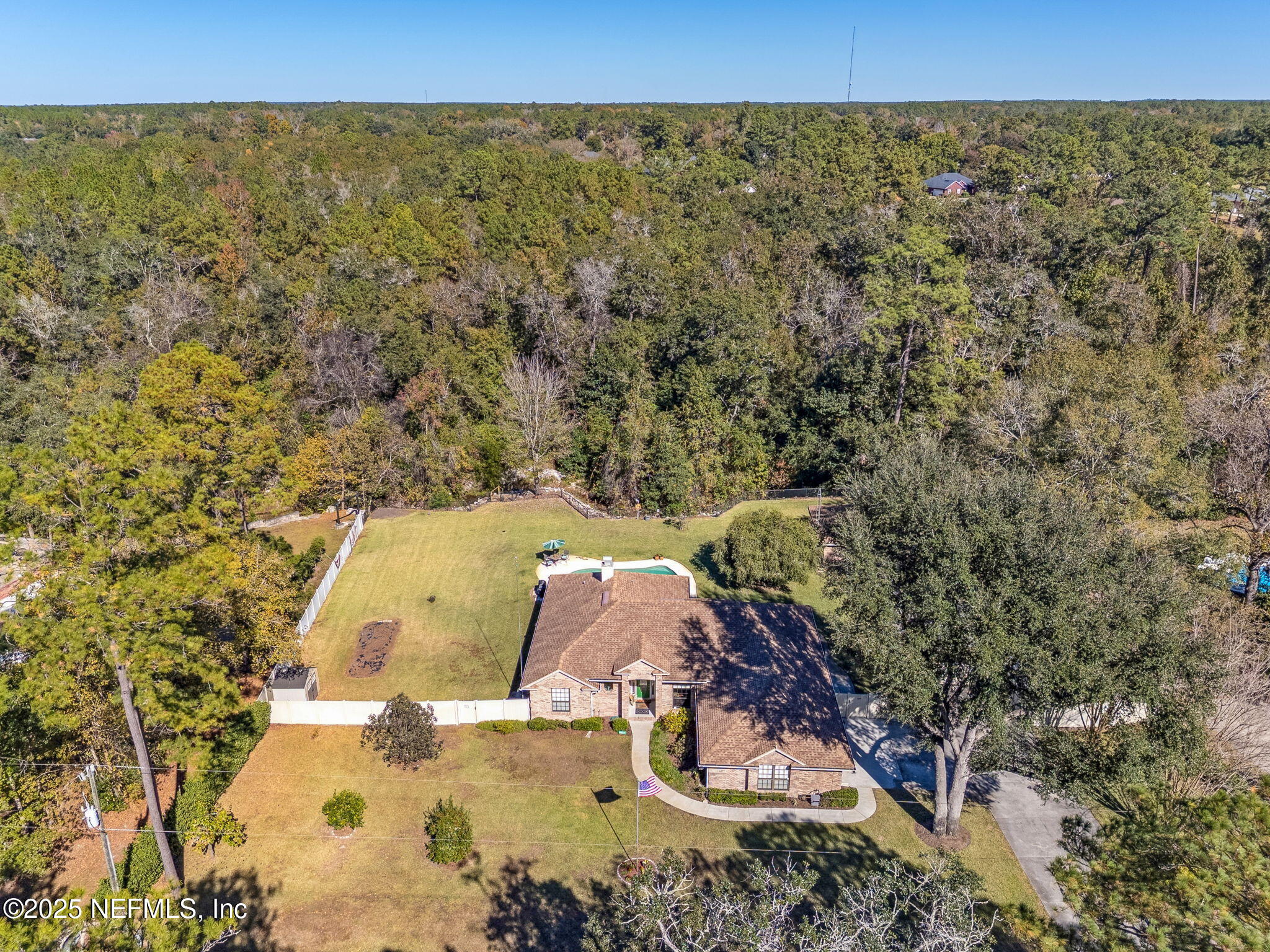 6897 Miltondale Road Macclenny, FL 32063 - Photo 48 of 58 an aerial view of a house with yard