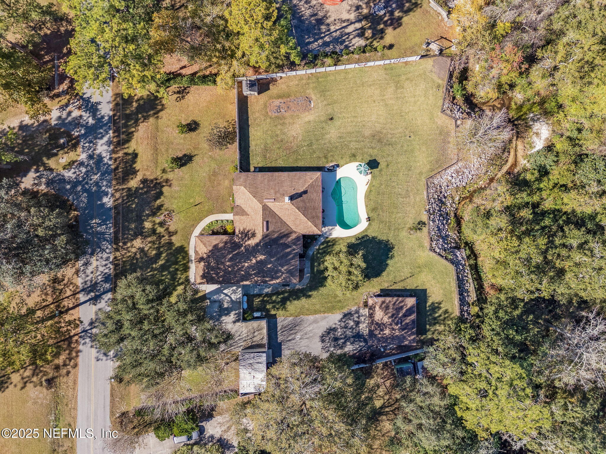 6897 Miltondale Road Macclenny, FL 32063 - Photo 49 of 58 an aerial view of a house with a yard