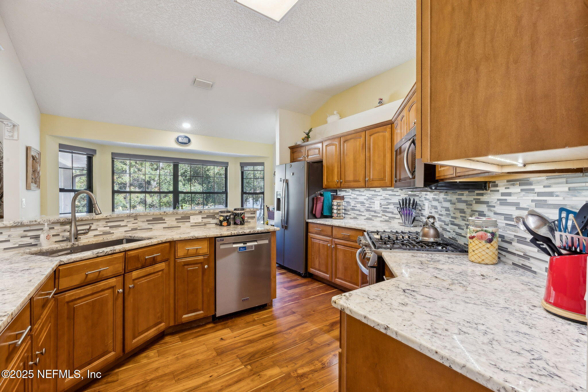 6897 Miltondale Road Macclenny, FL 32063 - Photo 5 of 58 granite counters, tile backsplashes