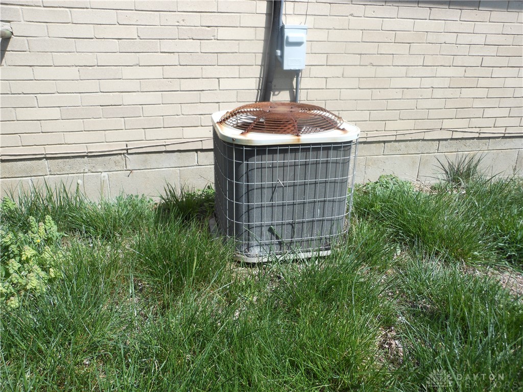 143 West Emerick Road West Milton, OH 45383 - Photo 30 of 37 This exterior features a reliable central air unit, providing comfort and efficiency.