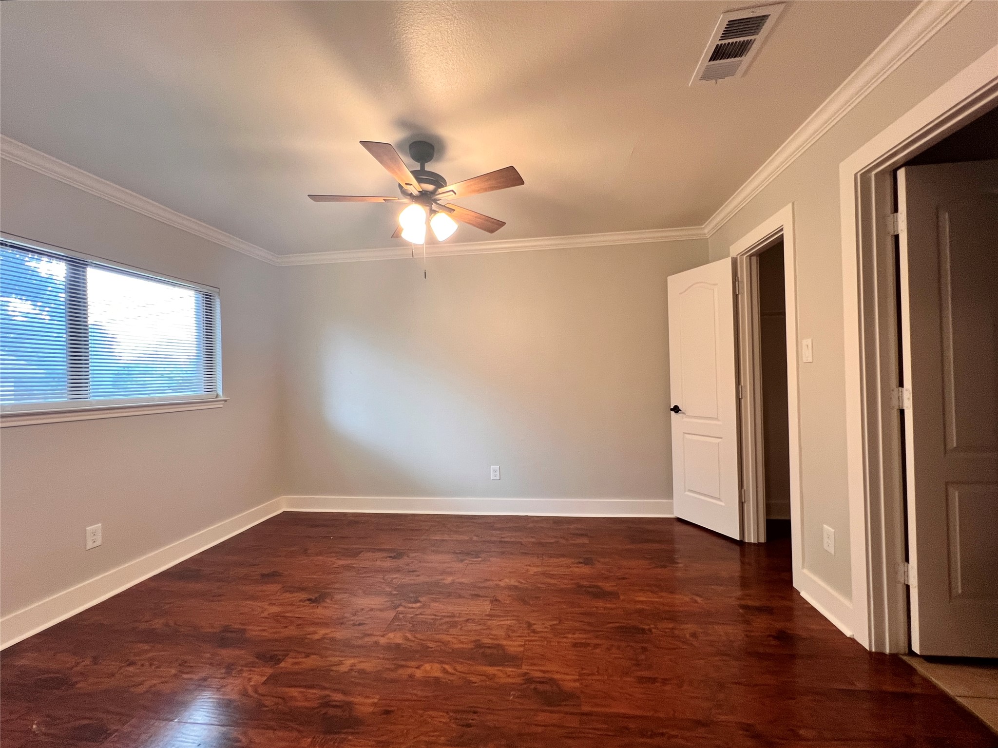 605 Luther Drive, Unit B Georgetown, TX 78628 - Photo 8 of 13 Primary bedroom has plenty of space!