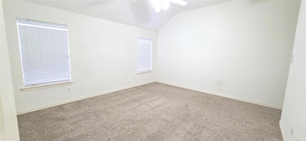 2697 Lake Ridge Drive Little Elm, TX 75068 - Photo 10 of 18 an empty room with a window