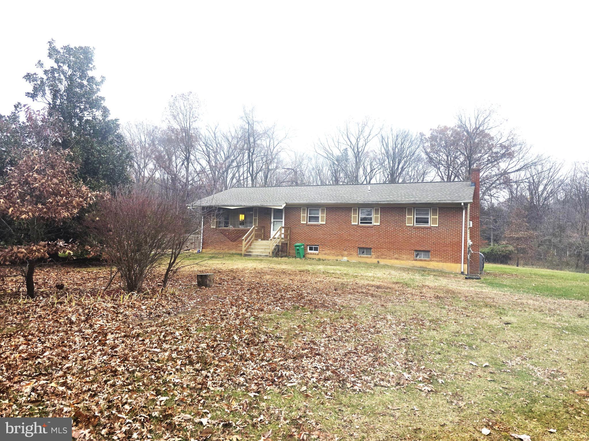 a house view with a garden space