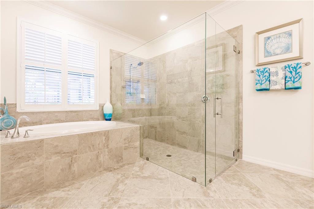 14360 Vindel Circle Fort Myers, FL 33905 - Photo 17 of 41 a spacious bathroom with a shower and a bathtub