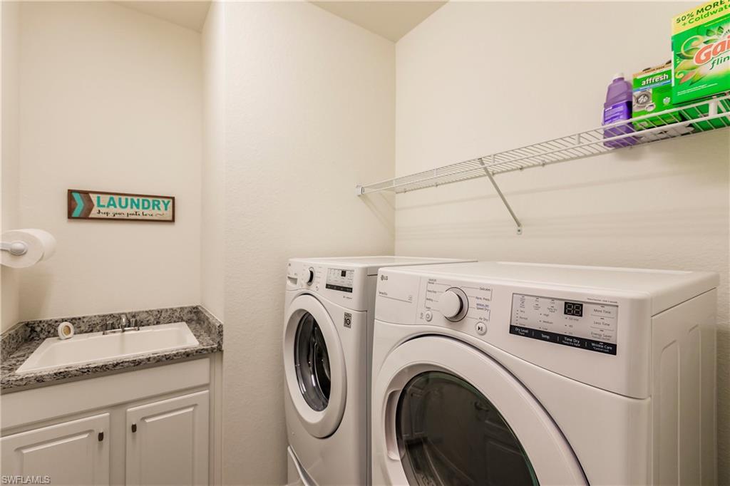 14360 Vindel Circle Fort Myers, FL 33905 - Photo 25 of 41 a utility room with dryer and washer