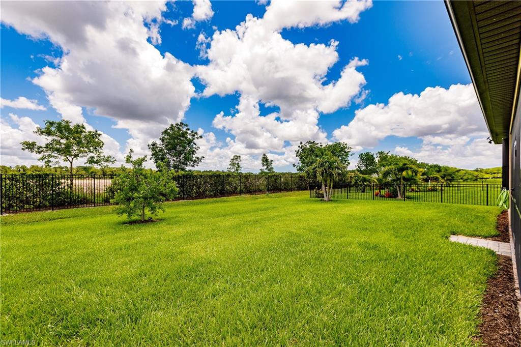 14360 Vindel Circle Fort Myers, FL 33905 - Photo 32 of 41 a view of a golf course with a lake