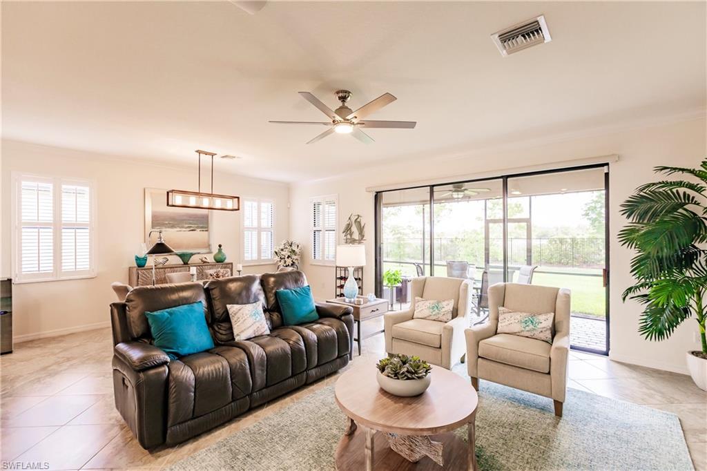 14360 Vindel Circle Fort Myers, FL 33905 - Photo 8 of 41 a living room with furniture and a large window