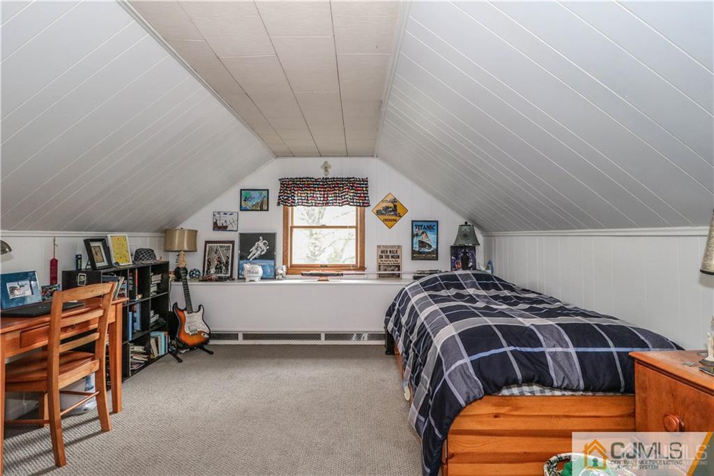 35 Stiles Road Edison, NJ 08817 - Photo 17 of 25 a bedroom with bed and a window