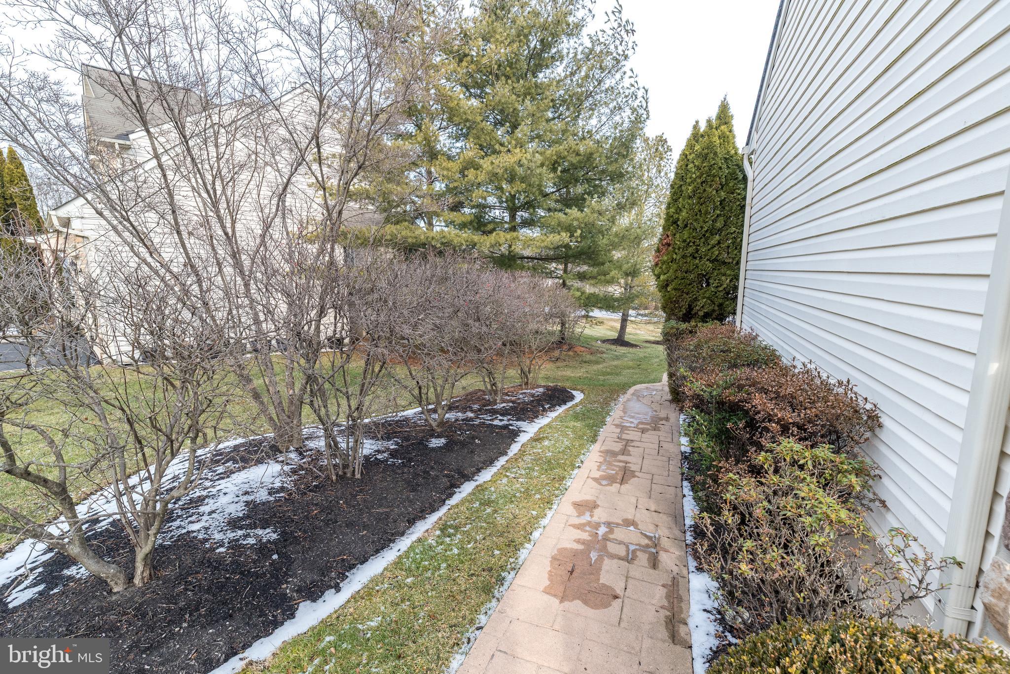 1837 Adams Way Jamison, PA 18929 - Photo 39 of 41 Paver walkway from front of house to back