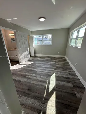 a view of a livingroom with a furniture