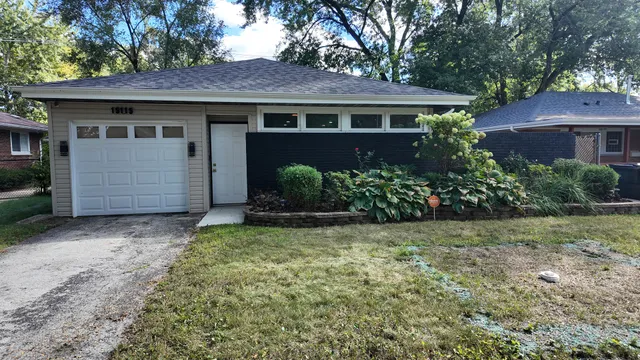 a view of a house with a garden