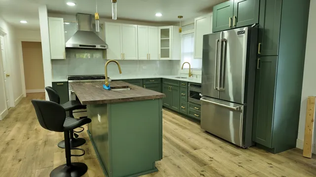 a kitchen with a sink and cabinets