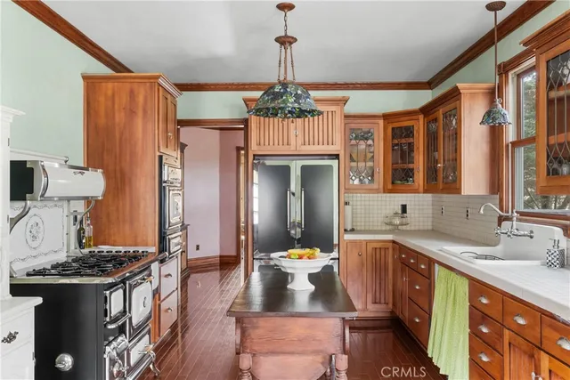 a bathroom with a sink a mirror and a toilet