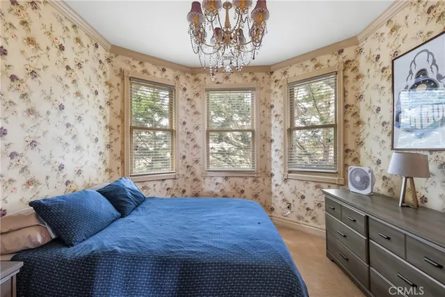 a view of a hallway with a bedroom