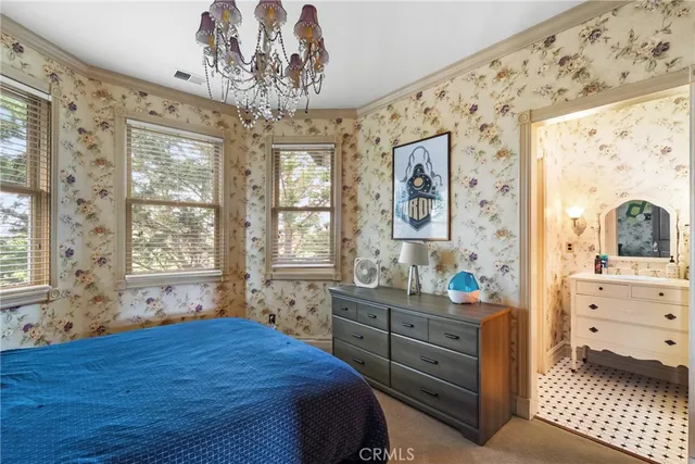 a bathroom with a toilet and a sink