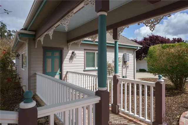 a bathroom with a sink a toilet and shower curtain