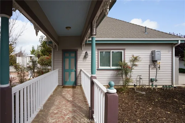 a view of a street with houses on both side