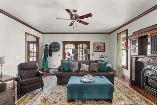 a living room with furniture and a rug