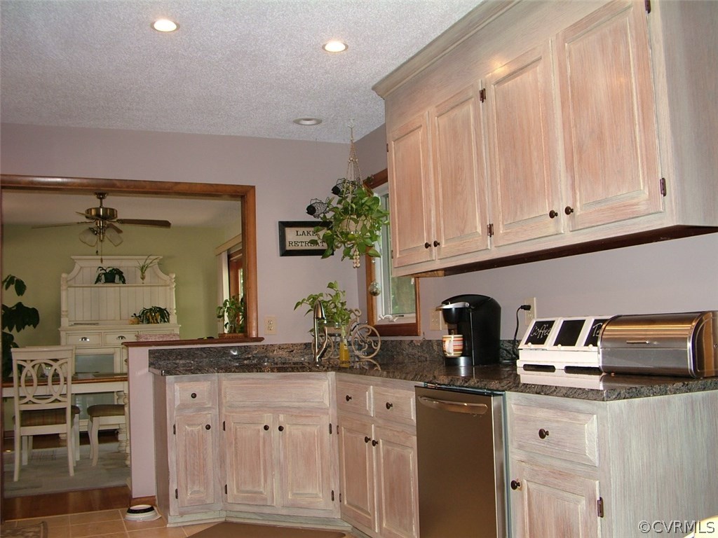 5721 Long Cove Road Midlothian, VA 23112 - Photo 17 of 42 a kitchen with white cabinets and a sink