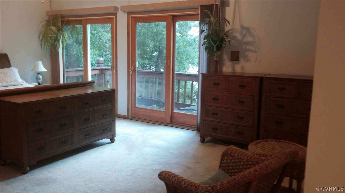 5721 Long Cove Road Midlothian, VA 23112 - Photo 26 of 42 a room with furniture and large windows