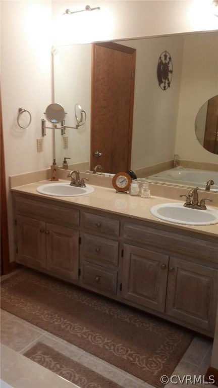 5721 Long Cove Road Midlothian, VA 23112 - Photo 30 of 42 a bathroom with a sink and a mirror