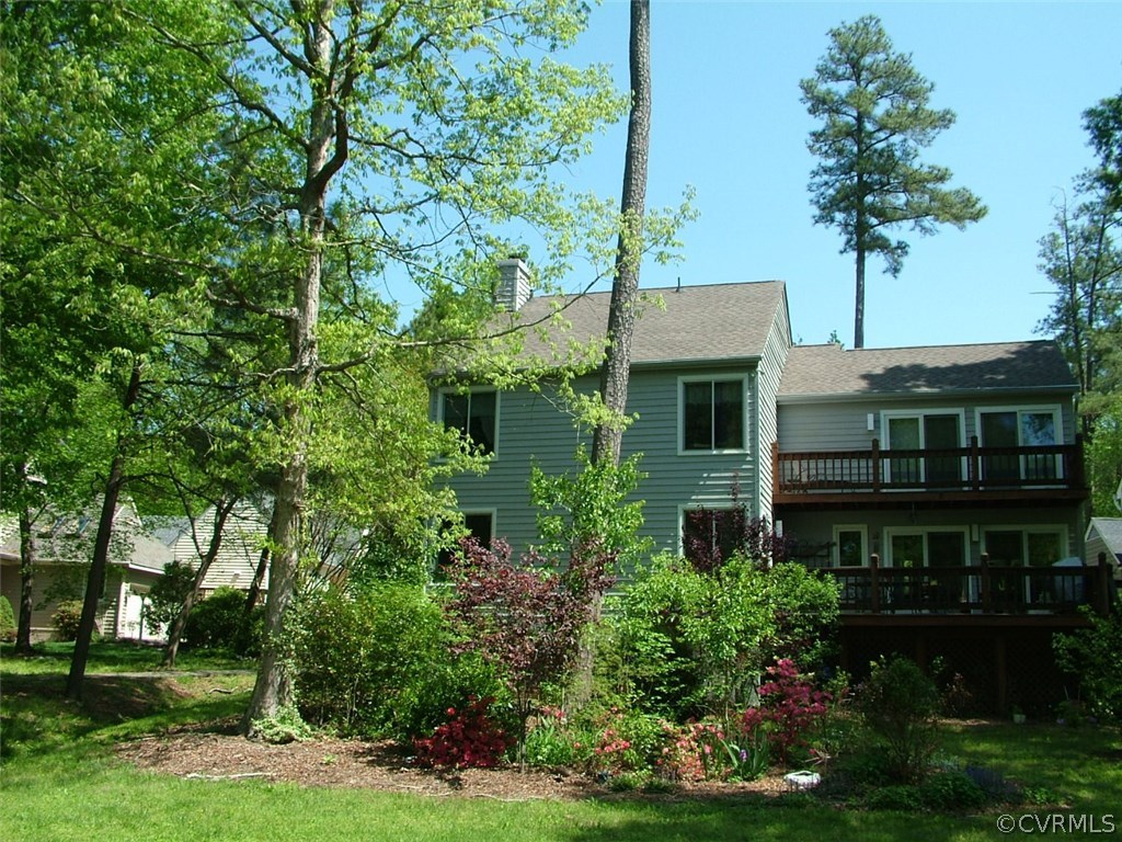 5721 Long Cove Road Midlothian, VA 23112 - Photo 8 of 42 a front view of house with yard and green space