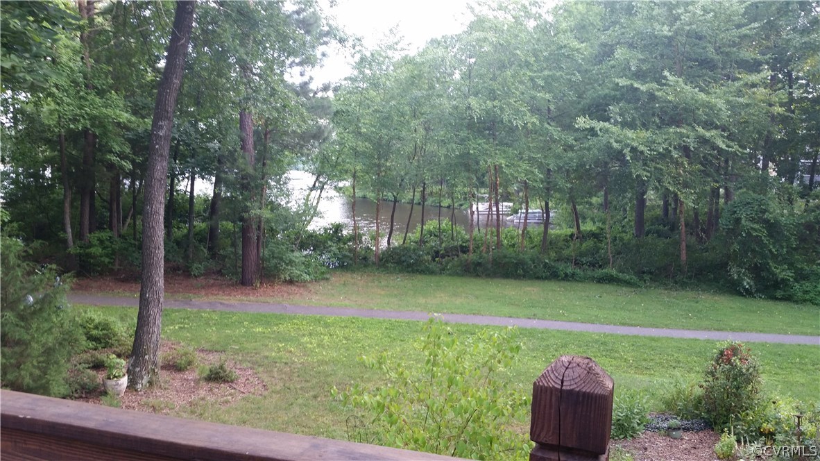 5721 Long Cove Road Midlothian, VA 23112 - Photo 10 of 42 a view of a backyard with green space