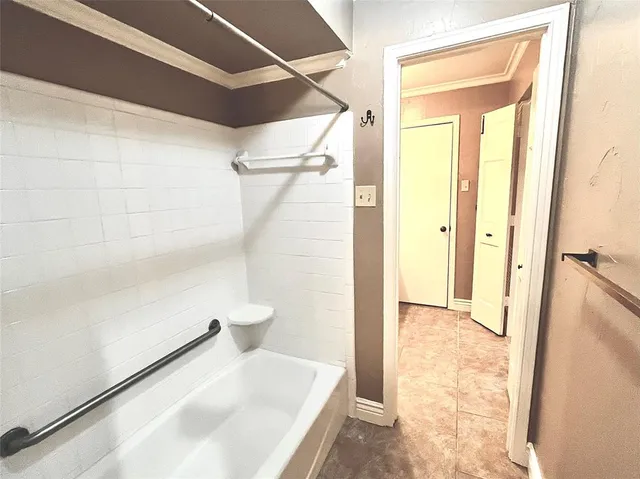 a bathroom with a sink and a shower