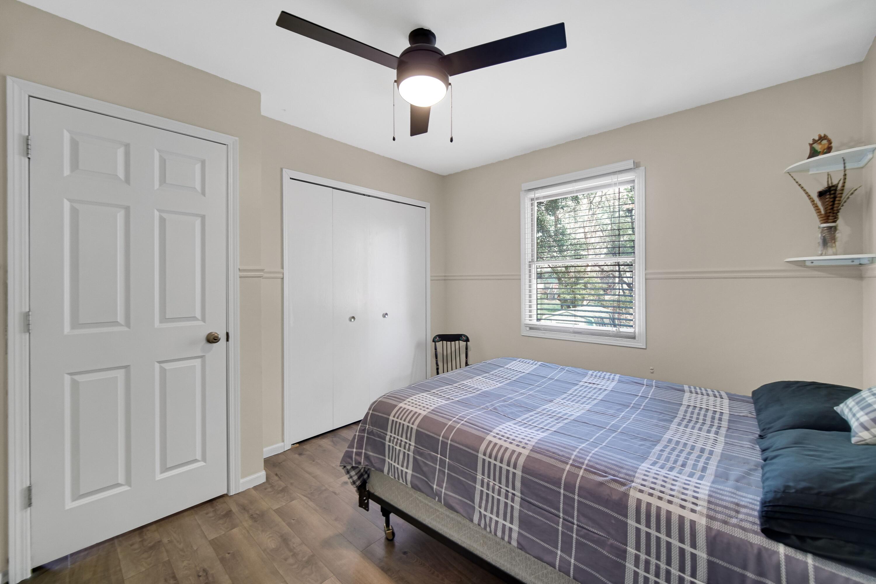 4000 Willowood Court Crown Point, IN 46307 - Photo 12 of 20 a bedroom with a large bed and a window