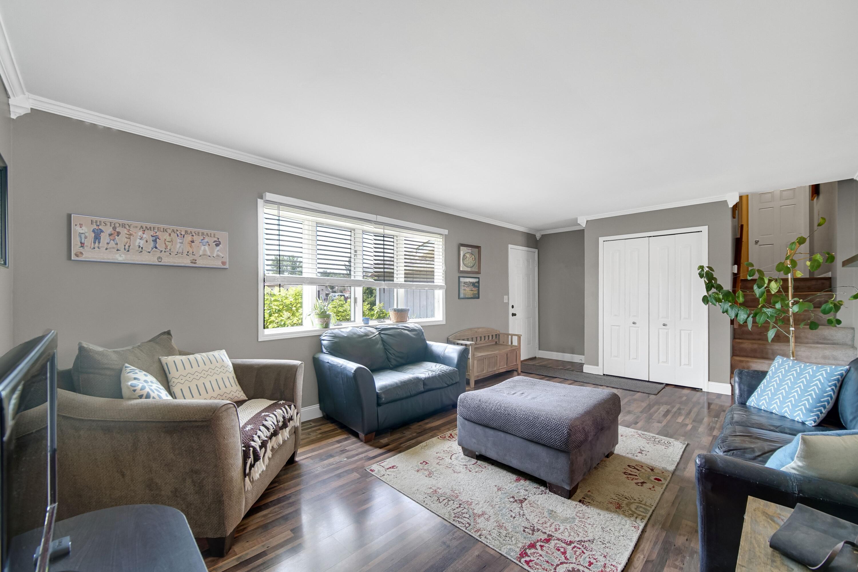 4000 Willowood Court Crown Point, IN 46307 - Photo 4 of 20 a living room with furniture and a large window