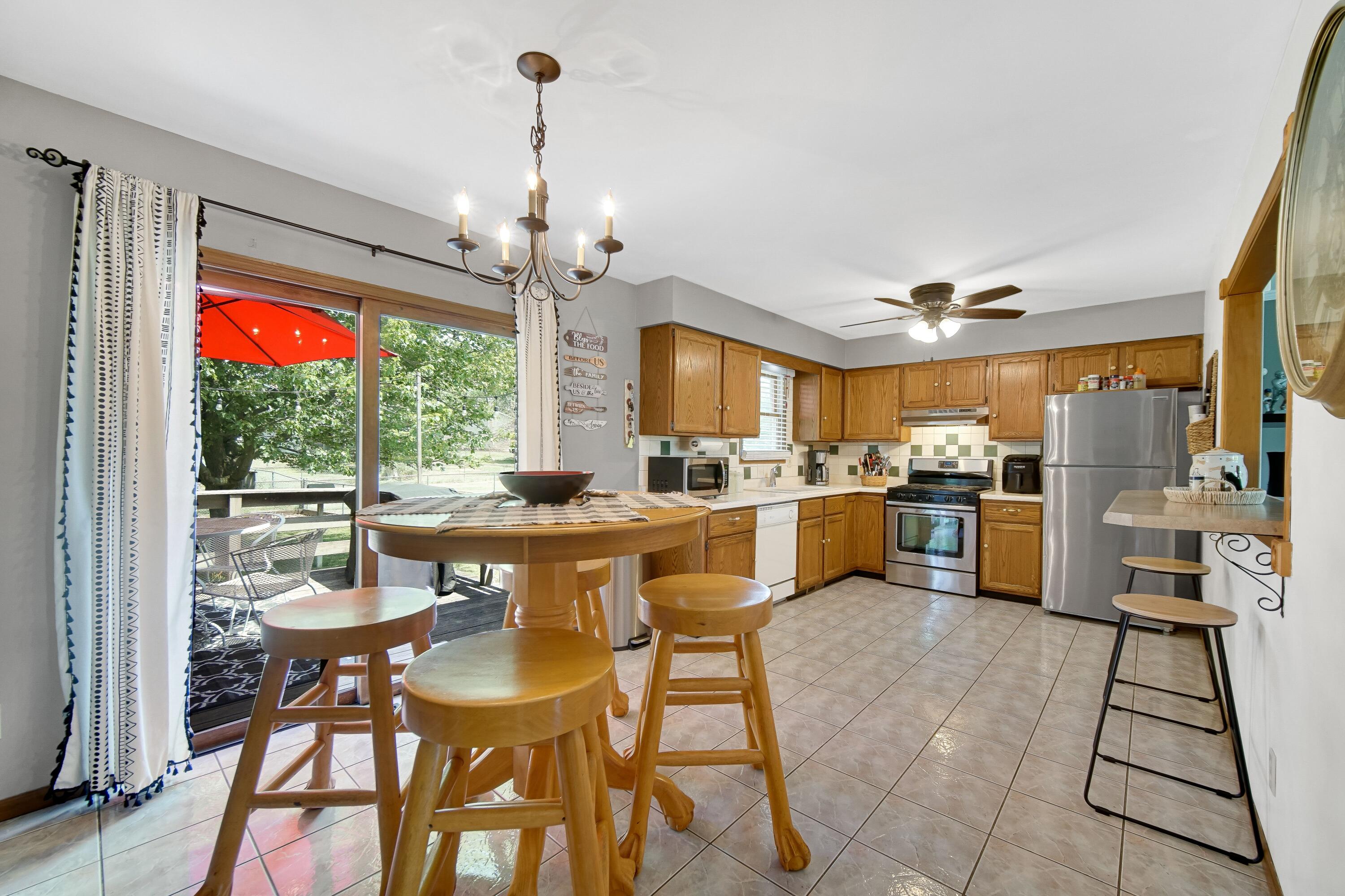 4000 Willowood Court Crown Point, IN 46307 - Photo 5 of 20 a view of a dining room and livingroom view