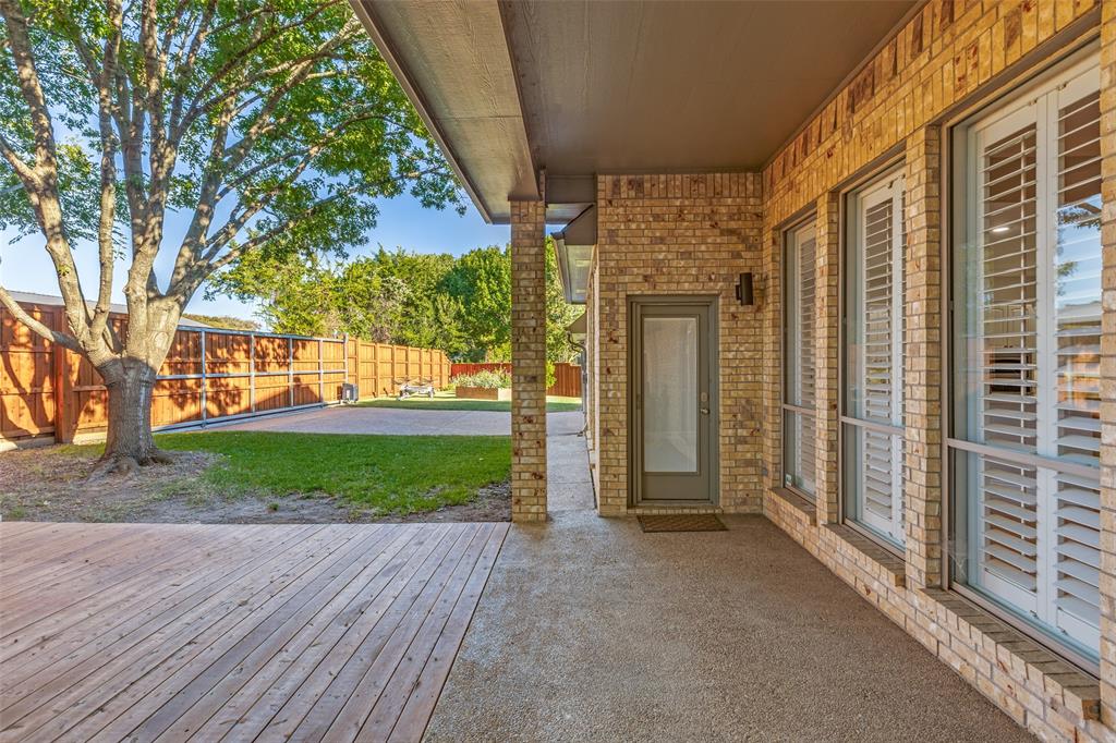 847 Turquoise Point Rockwall, TX 75032 - Photo 23 of 34 a view of a house with a yard
