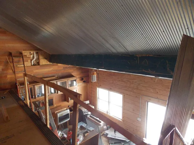 a view of a living room with furniture